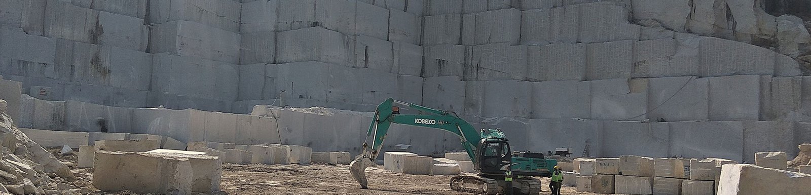Colonial white , gold , cream granite quarry blocks